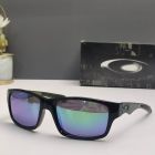 Oakley Jupiter Carbon Sunglasses Polished Black Frame Blue Lenses