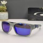 Oakley Jupiter Carbon Sunglasses Silver Frame Polarized Deep Blue Lenses