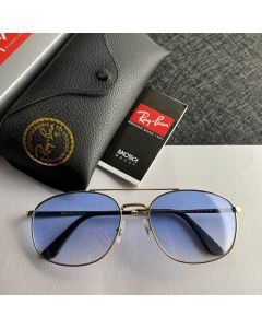 Ray Ban RB3654 Rectangular Sunglasses Gold Frame Clear Blue Lenses